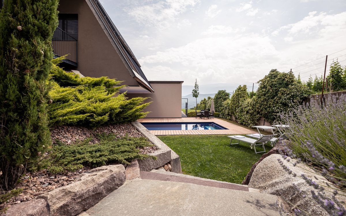 Garden with saltwater pool and lawn in Kaltern, South Tyrol